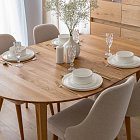 Runder Massivholztisch aus Eiche - ausziehbar